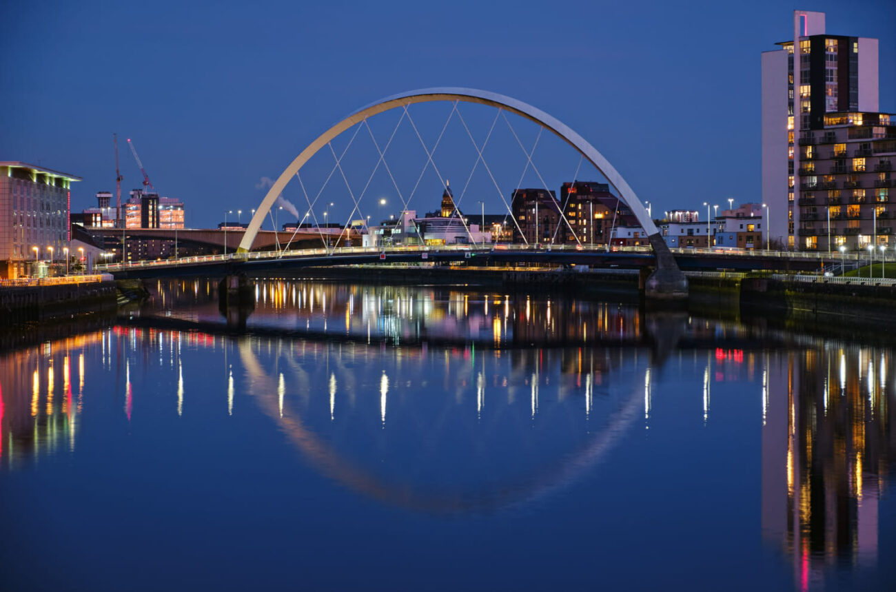 Night view of the clyde arc or squinty bridge and the river clyde, glasgow, scotland
